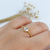 ANEL DE GOTA DE ZIRCÔNIA TRABALHADO BANHADO A OURO 18K
