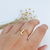 ANEL COM LETRA INICIAL (L) E PEDRA VERMELHO RUBI BANHADO A OURO 18K