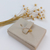 ANEL TRABALHADO COM ZIRCÔNIAS EM V BANHADO A OURO 18K - comprar online