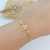 PULSEIRA DE NOSSA SENHORA APARECIDA COM ZIRCÔNIAS BANHADA A OURO 18K