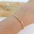 PULSEIRA RIVIERA DE ZIRCÔNIAS BANHADA A OURO 18K