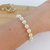 PULSEIRA DE PÉROLAS BANHADA A OURO 18K