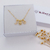 COLAR PERSONALIZADO COM 2 INICIAIS E CORAÇÃO COM ZIRCÔNIAS BANHADOS A OURO 18K - comprar online