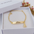 PULSEIRA INFANTIL DE CHAPINHA PERSONALIZADA COM PINGENTE DE NOSSA SENHORA APARECIDA BANHADA A OURO 18K