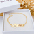 PULSEIRA INFANTIL MINIE PERSONALIZADA COM NOME BANHADA A OURO 18K - comprar online
