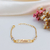 PULSEIRA INFANTIL PERSONALIZADA DE CHAPINHA COM CORAÇÕES E ZIRCÔNIAS BANHADA A OURO 18K