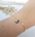 PULSEIRA CORAÇÃO AMOR AUTISMO BANHADA A OURO 18K