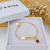 PULSEIRA INFANTIL PERSONALIZADA COM NOME E PINGENTE DE JOANINHA ESMALTADO BANHADA A OURO 18K - comprar online