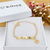 PULSEIRA INFANTIL PERSONALIZADA COM PINGENTE DE COROA BANHADA A OURO 18K