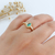 ANEL CRAVEJADO VERDE TURMALINA COM ZIRCÔNIAS BANHADO A OURO 18K