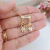 COLAR DE FILHOS COM CASAL BANHADO A OURO 18K na internet