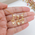 COLAR DE FILHOS 2 MENINOS E 1 MENINA COM ZIRCÔNIAS BANHADO A OURO 18K - comprar online