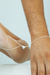 Kit 2 pulseiras coração imã