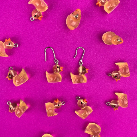 Brinco pato transparente