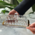 Manteigueira Radial com Borda Dourada em Cristal 18cm - comprar online