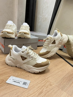 TENIS PRADA OFF WHITE CARAMELO PREMIUM na internet