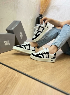 NB CT302 BRANCO PRETO SOLA ALTA - TenisVel