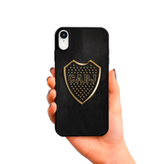 Escudo dorado, fondo negro