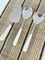 Cuchara dentada de acero y ceramica plateada/blanco MISHKA - VICA