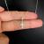 Colar Feminino Crucifixo Cravejado Pequeno em Prata 925 na internet