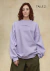 Modelo mujer buzo oversize Lila En Palabras
