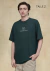 frente de remera verde oversize En Palabras