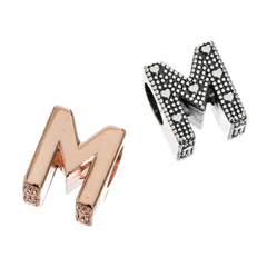 Charm inicial M