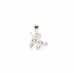 Dije caniche con piedras