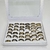 Caja cerrada x 36 unidades (Anillo líneas-Acero Dorado)