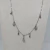 Cadena con dijes estrellas y colgantes strass (A.Q.) - comprar online