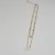 Cadena doble con flor Blanca (Acero Dorado) - comprar online