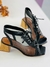 Imagem do Sandália Couro e Tela com Cadarço Salto Fachete Médio, a escolha perfeita para quem busca conforto e estilo em qualquer ocasião. Com um design moderno