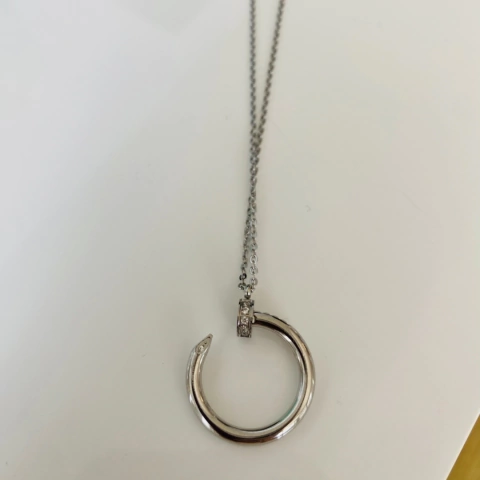 collar clavo plateado