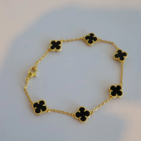 pulsera mini trebol dorada y negro - comprar online