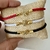 Pulsera inicial cordón blanco - comprar online
