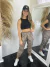 Calça Cargo Jogger Tactel Feminina Com Correntes e Detalhes Refletivos na internet