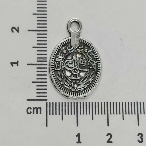 Dije moneda con detalles x 25 grs.