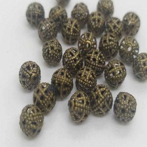 Bolita filigranada 6mm bronce x 10grs