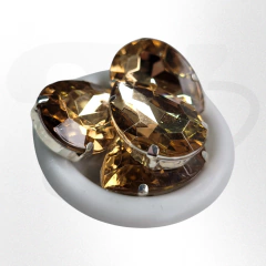 Gemas gota brillosas con base 10mmx14mm x 25 u. Calidad para soldar y pegar