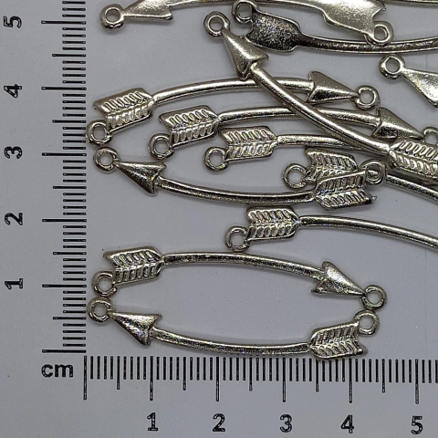 Dije flecha doble enganche x 25 gramos