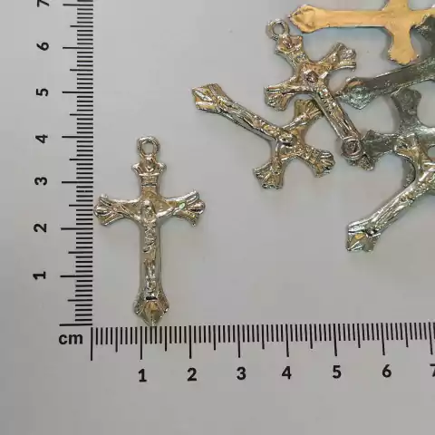 Dije cruz mediana x 25 grs.