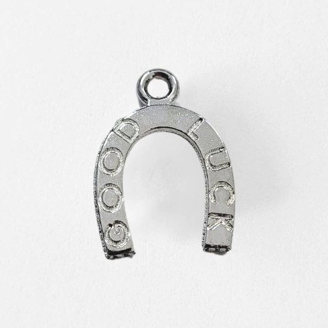 Dije herradura x 25 gramos