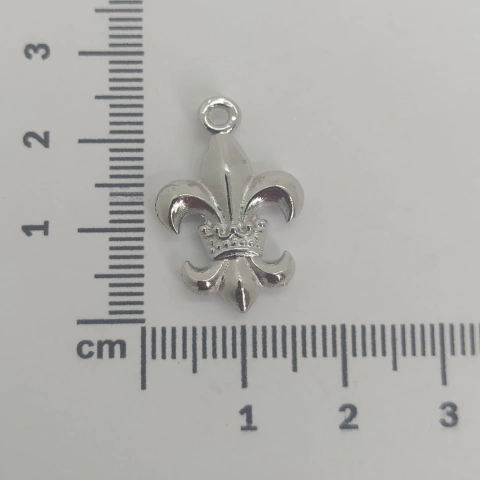 Dije flor de lis x 25 grs.