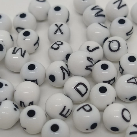 Letritas infantiles redonda 8mm blanca letra negra x 25grs