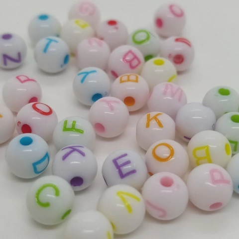 Letritas infantiles redonda 8mm blanca letra multicolor x 25grs