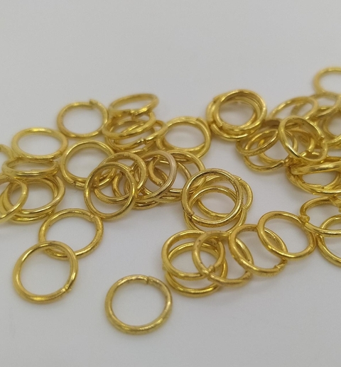 Argollita de unión dorada 4mm x 50grs aprox