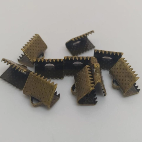 Piraña 10mm x 50 unidades Bronce