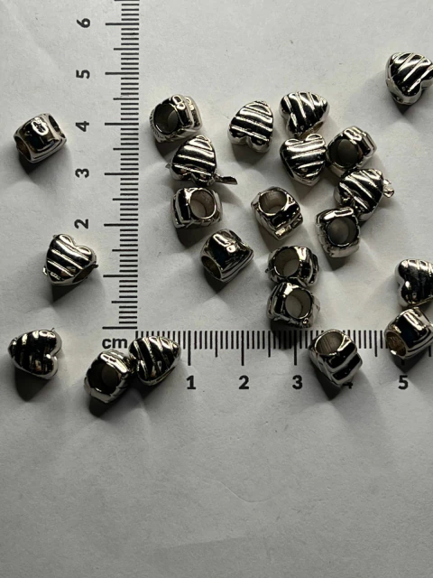 Pasante corazón rayado x25gramos