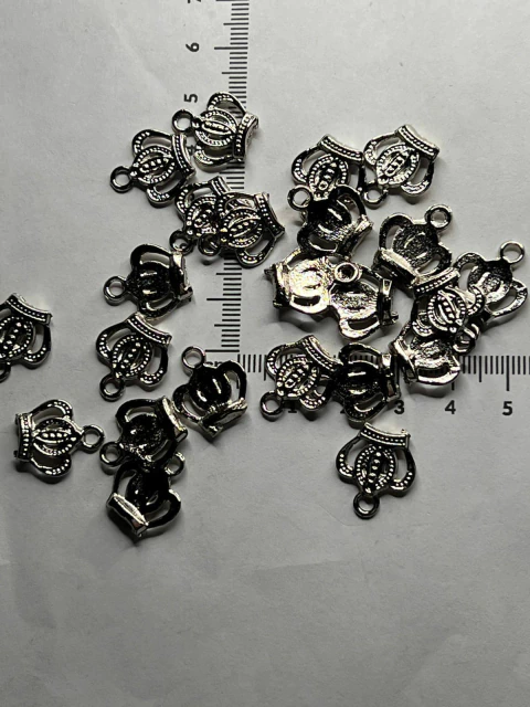 Dije corona pequeña x 25gramos