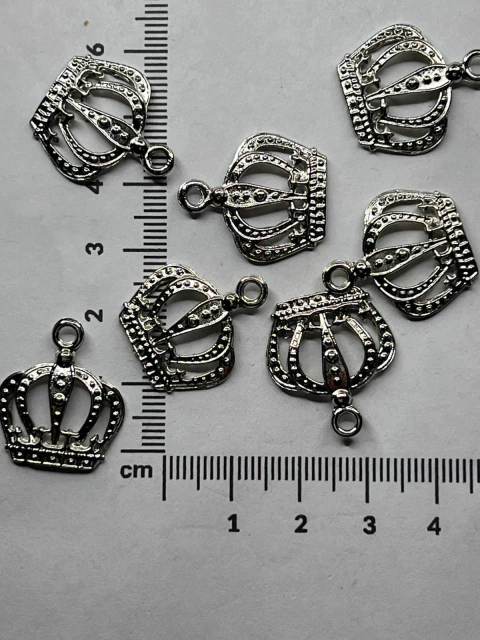 Dije corona x25 gramos